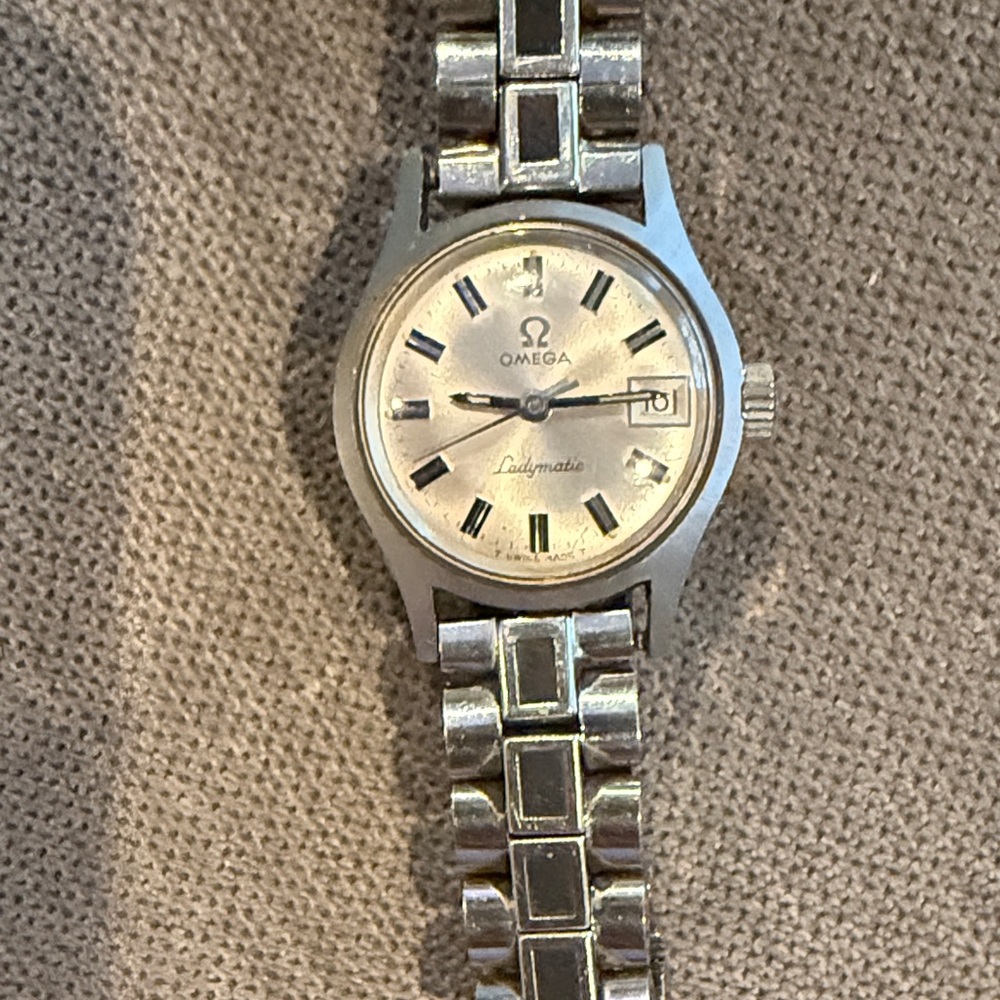 Omega Ladymatic Silver Watch with Black Accents